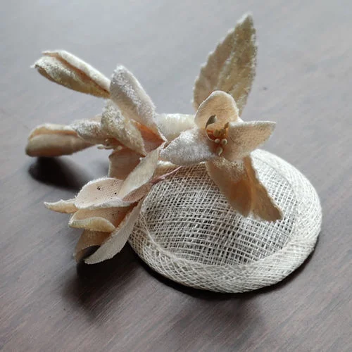 Beige mini headwear fascinator ideal for ages 0-3