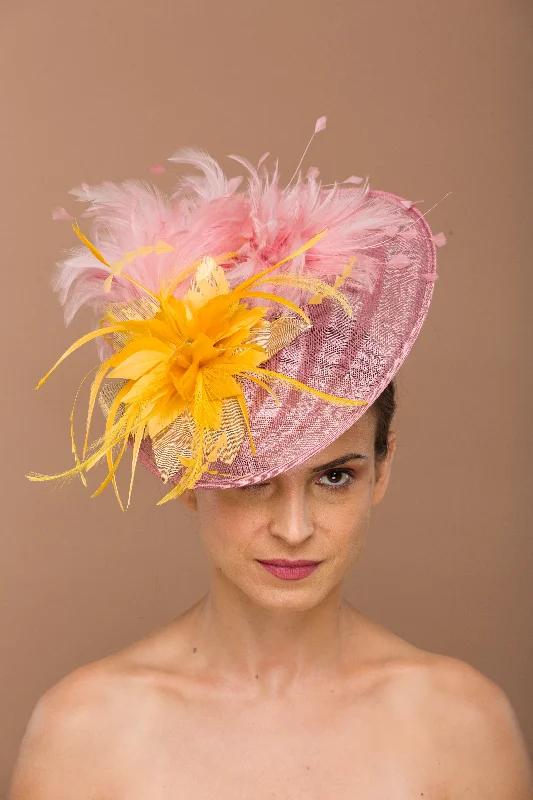 Lillian- pink fascinator with feathers and golden yellow flower