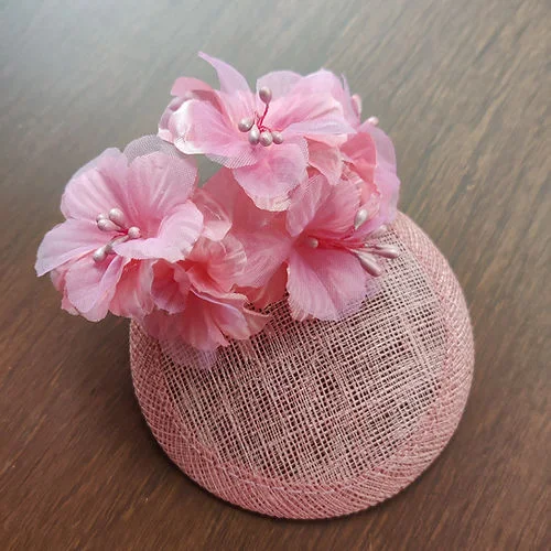 Pink mini headwear fascinator ideal for ages 0-3