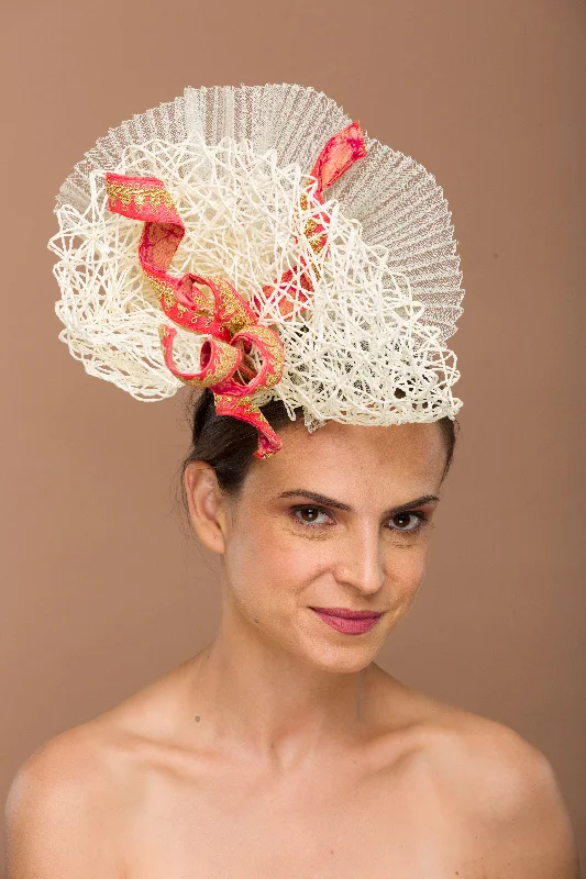 Freshet- off white fascinator with peach twirl mount